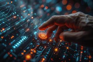 A hand with a finger is activating a button on an electric blue computer screen photo