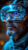A man, with a beard, wearing a virtual reality headset photo