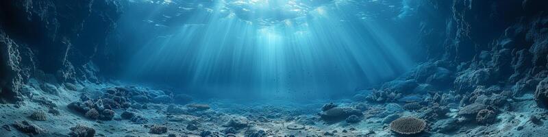 The bright sun is casting light through the clear water of the ocean photo