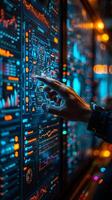 Hand pointing at computer screen with technology and engineering keywords photo