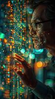 Man in glasses touching digital screen with finger photo