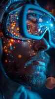 The goggles reflect the image of a man with a helmet and goggles photo