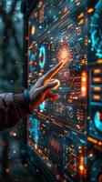 A finger touches a futuristic screen showing electric blue colors photo