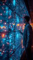 A man is standing in front of a mesmerizing wall of bright lights photo