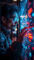 Man with glasses looking at futuristic screen in space with entertainment photo