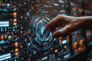 A hand is pressing a button on a futuristic screen with an electric blue hue photo