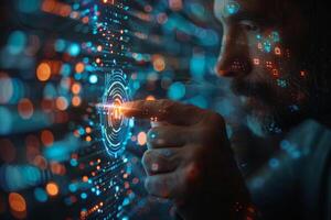 A man is using his finger to interact with a hightech display photo