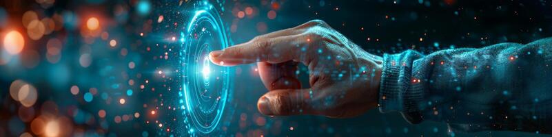 A hand presses a button on a futuristic screen with an electric blue glow photo