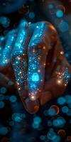 A close up of hands with glowing lights in darkness photo