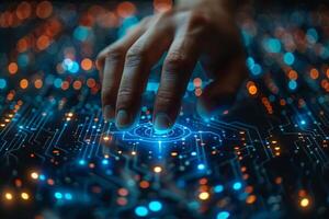 Closeup of a persons hand pressing button on circuit board photo