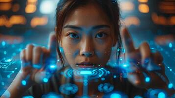 A woman interacts with a hightech screen using her fingers photo