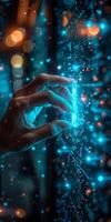 Person with glowing glass object in azure, purple, and electric blue colors photo