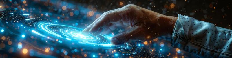 In the image, a hand is seen pressing a button on a hightech display panel photo