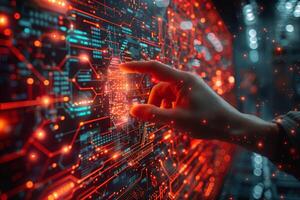 A hand is pointing at a circuit board displayed on a computer screen photo