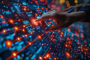 A persons finger is pointing at a computer screen photo