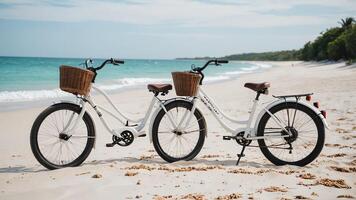 bicycles parked on the beach next to the ocean photo