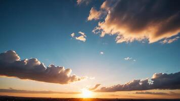 view of the sky with the orange light of the sun photo