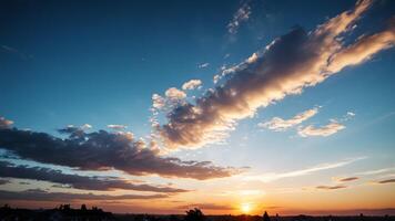 view of the sky with the orange light of the sun photo