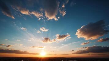 view of the sky with the orange light of the sun photo