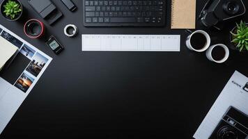 items on black table, background design of random objects on table photo