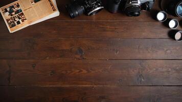 items on brown table, background design of random objects on table photo