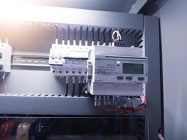 Installation control modul of Digital Electric meter on panel control power plant. photo