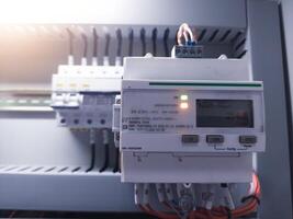 Installation control modul of Digital Electric meter on panel control power plant. photo