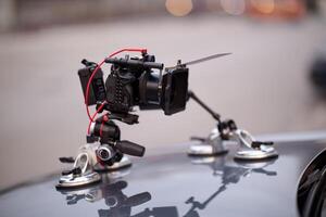 A professional camera rig is mounted on a vehicle, ready for filming cinematic projects and advertisements on the go photo