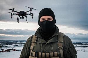 military operator with a reconnaissance drone in the background photo