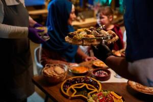 In a heartwarming scene, a professional chef serves an European Muslim family their iftar meal during the holy month of Ramadan, embodying cultural unity and culinary hospitality in a moment of shared photo