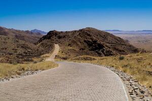 View on Spreetshoogte pass, Spreetshoogtepas in Afrikaans, mountain pass in central Namibia, connecting the Namib Desert with the Khomas Highland by traversing the Great Escarpment. photo