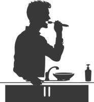 silhouette man brushing his teeth in front of the sink black color only vector