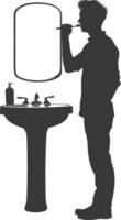 silhouette man brushing his teeth in front of the sink black color only vector