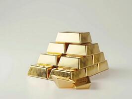 Stacks of gold bars on white background photo