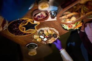 In this captivating aerial view, delicious food adorned with Ramadan decorations, including dates and meat, awaits the arrival of an European Islamic family, promising a festive and flavorful iftar photo