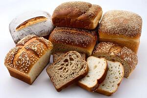 Assortment of breads and rolls on a white surface photo