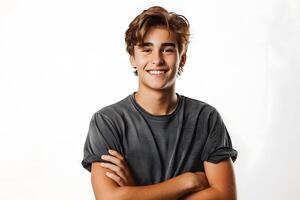 Young man with arms crossed smiling photo