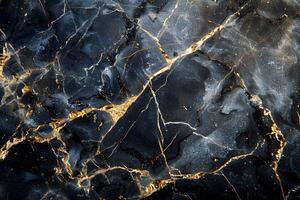 Black marble with gold veinings and a black backdrop photo