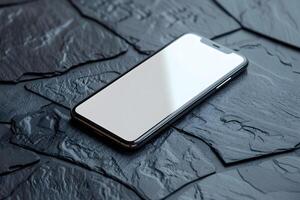 A cell phone close up on black surface photo