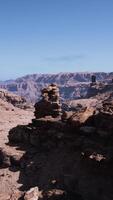 A rocky area with rocks and a sky background video