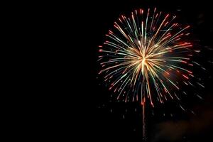 Colorful fireworks illuminate the dark night photo