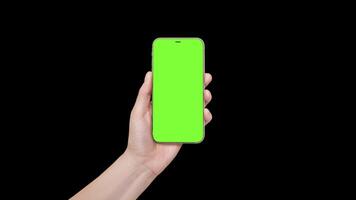 A woman's hand holds a phone chromakey Mockup and presses button finger in the center of the screen. Isolated on black background animation 4k video