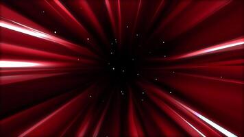 A red looped tunnel on a black background. Velocity of red matter in space. Blood particles in the veins. A lover's journey. 4k, 60 fps, HD. Dark gradient rays flying along the video