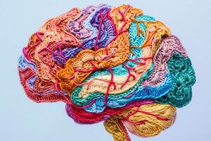 Colorful crocheted brain model. Creative artistic concept. photo