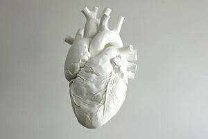 Ethereal floating heart sculpture in white. Art concept photo