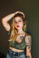 A close up of a woman with tattoos on her arms photo