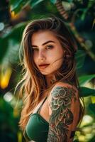 A close up of a woman with a tattoo on her arm photo