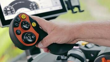 Combine harvester control joystick. The combine pulls the joystick lever towards itself. video