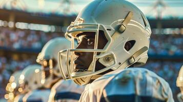 Football player in a white uniform with a helmet on photo