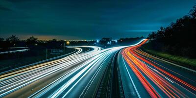 A highway at night with light trails from long exposure photo